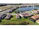 Aerial view of homes and lakefront property at 13333 Oakenshaw Ln, Orlando, FL 32832