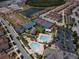 Community pool, tennis, and basketball courts at 13333 Oakenshaw Ln, Orlando, FL 32832