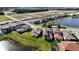 Aerial view of homes and lakefront property at 13333 Oakenshaw Ln, Orlando, FL 32832