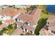 Aerial view of a two-story house with a brown tile roof at 13333 Oakenshaw Ln, Orlando, FL 32832