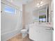 Bathroom with tub, toilet and vanity at 13333 Oakenshaw Ln, Orlando, FL 32832