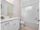 Small bathroom with white vanity, toilet and shower at 13333 Oakenshaw Ln, Orlando, FL 32832
