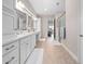 Double vanity bathroom with a large shower at 13333 Oakenshaw Ln, Orlando, FL 32832