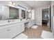 Double vanity bathroom with a large shower at 13333 Oakenshaw Ln, Orlando, FL 32832