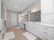 Double vanity bathroom with a large shower at 13333 Oakenshaw Ln, Orlando, FL 32832