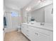 Clean bathroom with double vanity and bathtub at 13333 Oakenshaw Ln, Orlando, FL 32832
