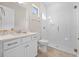 Bathroom with white vanity and large shower at 13333 Oakenshaw Ln, Orlando, FL 32832