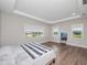Spacious bedroom with large windows and wood floors at 13333 Oakenshaw Ln, Orlando, FL 32832