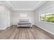 Bedroom with large windows and wood floors at 13333 Oakenshaw Ln, Orlando, FL 32832