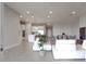Spacious living area with open floor plan and view of kitchen at 13333 Oakenshaw Ln, Orlando, FL 32832