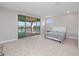 Main bedroom with sliding doors to balcony at 13333 Oakenshaw Ln, Orlando, FL 32832