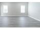 Empty bedroom with gray vinyl flooring and neutral walls at 1513 23Rd St, Orlando, FL 32805