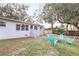 Spacious backyard with firepit and seating at 2827 Euston Rd, Winter Park, FL 32789