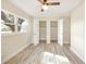 Well-lit bedroom with double closets and ceiling fan at 2827 Euston Rd, Winter Park, FL 32789