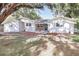 Newly renovated home with a landscaped front yard at 2827 Euston Rd, Winter Park, FL 32789