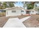 House exterior with walkway and landscaping at 2827 Euston Rd, Winter Park, FL 32789