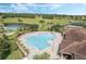 Resort-style pool with a spa and lounge area at 3632 Serena Ln, Clermont, FL 34711