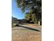 One-story home with a long driveway and carport at 3898 W Washington St, Orlando, FL 32805