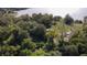 Overgrown lot with boat and waterfront access at 3910 W Washington St, Orlando, FL 32805