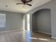 Bright and airy living room with tile floors and access to patio at 6612 S Goldenrod Rd # 104C, Orlando, FL 32822