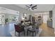 Open concept dining area adjacent to kitchen, featuring modern furniture at 7023 Talbot Dr, Orlando, FL 32819