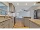 Open kitchen features granite countertops and an island at 7023 Talbot Dr, Orlando, FL 32819