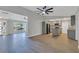 Modern kitchen with gray cabinets, granite countertops, and stainless steel appliances at 7023 Talbot Dr, Orlando, FL 32819