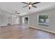 Bright and airy living room with hardwood floors and high ceilings at 7023 Talbot Dr, Orlando, FL 32819