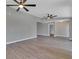 Spacious living area featuring hardwood floors and a high ceiling at 7023 Talbot Dr, Orlando, FL 32819