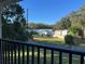 View from balcony showing neighborhood and tree-lined street at 810 E Yorkshire Dr, Deland, FL 32724