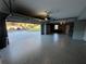 Spacious garage with epoxy flooring and open door at 810 E Yorkshire Dr, Deland, FL 32724
