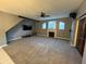 Living room with fireplace, large TV, and ample space at 810 E Yorkshire Dr, Deland, FL 32724