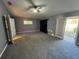 Spacious main bedroom with access to a private balcony at 810 E Yorkshire Dr, Deland, FL 32724