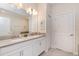 Double vanity bathroom with a linen closet at 8823 Interlocking Ct, Davenport, FL 33896