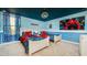 Two twin beds with Spiderman themed bedding and decor at 8823 Interlocking Ct, Davenport, FL 33896