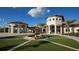 Resort-style community clubhouse with fountain and outdoor seating at 8823 Interlocking Ct, Davenport, FL 33896