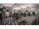 Modern fitness center with cardio and weight equipment at 8823 Interlocking Ct, Davenport, FL 33896
