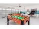 Game room with pool table, foosball, and basketball game at 8823 Interlocking Ct, Davenport, FL 33896
