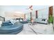 Spacious living room with teal sectional sofa and coffee table at 8823 Interlocking Ct, Davenport, FL 33896
