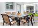 Outdoor patio with table and chairs, perfect for dining at 8823 Interlocking Ct, Davenport, FL 33896