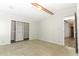 Spacious bedroom with large closet and access to other rooms at 165 Moss Dr, Debary, FL 32713