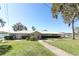 Community building near waterfront with a bench at 165 Moss Dr, Debary, FL 32713