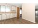 Kitchen with white appliances and wood cabinets at 165 Moss Dr, Debary, FL 32713