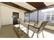 Covered porch with outdoor furniture and screened windows at 165 Moss Dr, Debary, FL 32713
