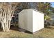 White metal storage shed with double doors at 165 Moss Dr, Debary, FL 32713