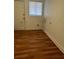 Laundry area with vinyl flooring and hookups at 1730 N Orange St, Mount Dora, FL 32757