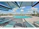 Resort-style pool with lounge chairs and umbrellas at 3571 Dahlia Dr, Lake Hamilton, FL 33851