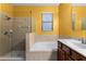 Bathroom with shower, tub, and double vanity at 3719 Briar Run Dr, Clermont, FL 34711