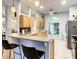 Spacious kitchen with light wood cabinets and granite countertops at 4217 Sky Flower Ln, St Cloud, FL 34772