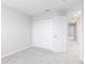 Bright bedroom with large closet and hallway access at 4701 New Orleans Cv, Oviedo, FL 32765
